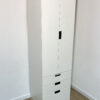 Grande armoire blanche avec tiroirs