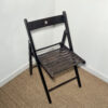 Chaise pliante en bois noir