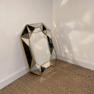 Miroir géométrique au cadre doré