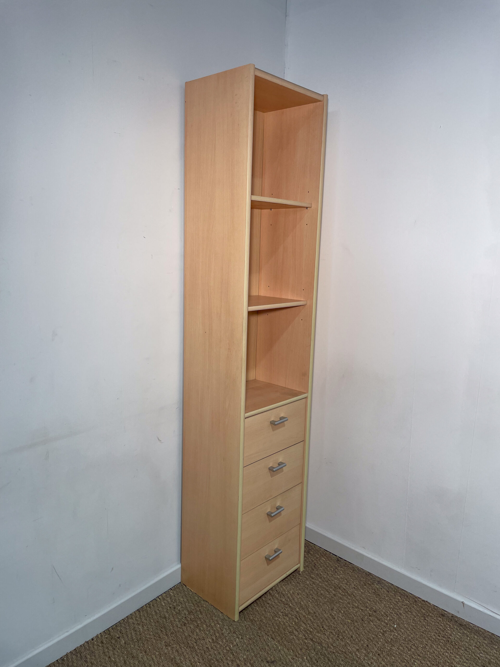 Bibliothèque claire à tiroirs